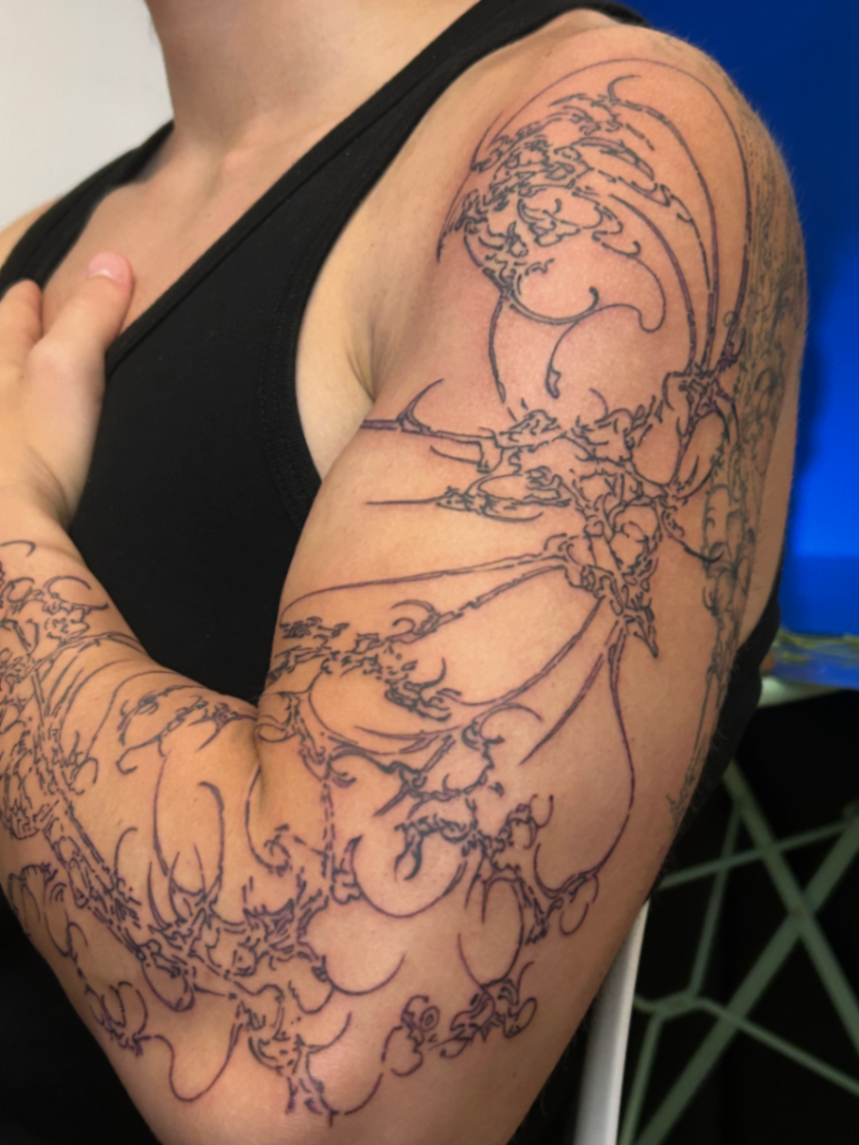 Fine line freehand sleeve outline in progress